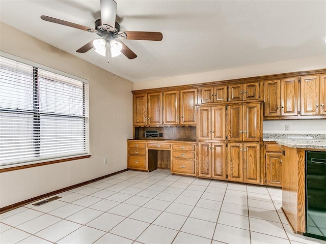 12104 Cantle Rd, Oklahoma City, OK 73120 - kitchen with a ceiling fan, brown cabinetry, and light tile patterned floors