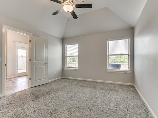 3909 Palisade Ln, Oklahoma City, OK 73179 - unfurnished room featuring carpet, lofted ceiling, a ceiling fan, and baseboards
