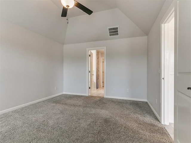 3909 Palisade Ln, Oklahoma City, OK 73179 - unfurnished bedroom featuring vaulted ceiling, light carpet, baseboards, and ceiling fan