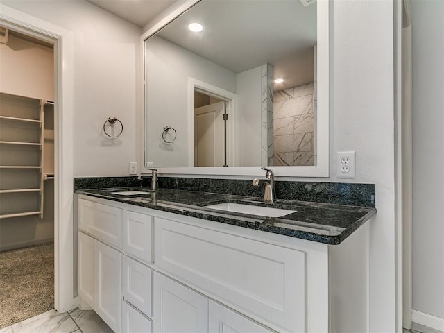 3909 Palisade Ln, Oklahoma City, OK 73179 - full bath with double vanity, marble finish flooring, and recessed lighting