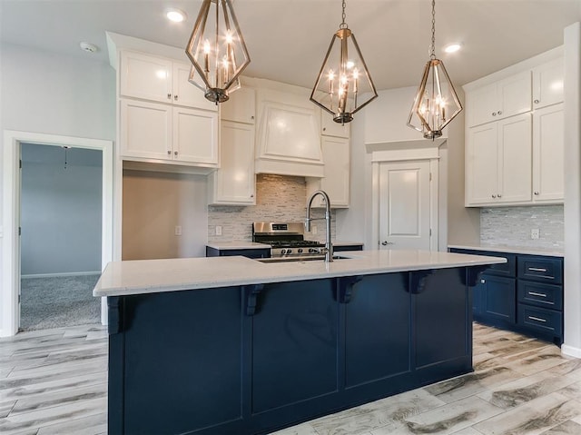 3909 Palisade Ln, Oklahoma City, OK 73179 - kitchen with a chandelier, light countertops, recessed lighting, backsplash, and white cabinetry