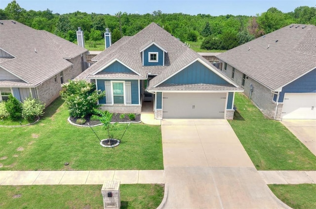 3909 Palisade Ln, Oklahoma City, OK 73179 - craftsman inspired home with brick siding, a garage, a front yard, and concrete driveway