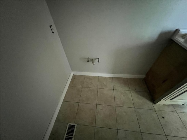 74 Fox Run Cir, Jenks, OK 74037 - washroom featuring tile patterned floors and baseboards
