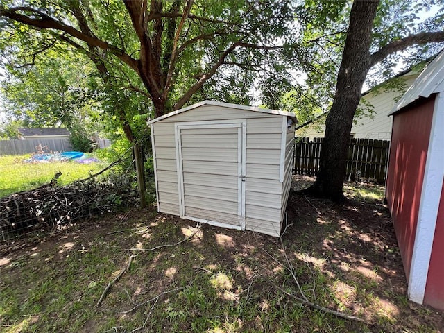 74 Fox Run Cir, Jenks, OK 74037 - view of shed featuring a fenced backyard