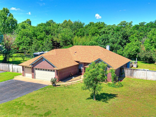 7705 Dripping Springs Ln, Oklahoma City, OK 73150 - ranch-style home featuring driveway, brick siding, a garage, and a chimney
