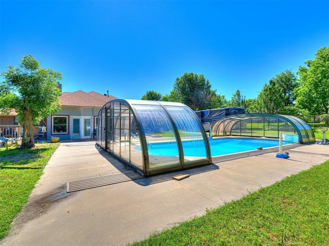 7705 Dripping Springs Ln, Oklahoma City, OK 73150 - outdoor pool with a yard