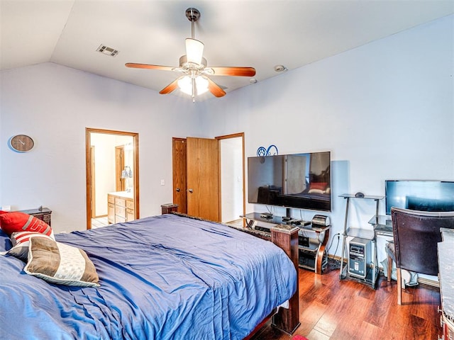 7705 Dripping Springs Ln, Oklahoma City, OK 73150 - bedroom featuring wood finished floors, lofted ceiling, and a ceiling fan