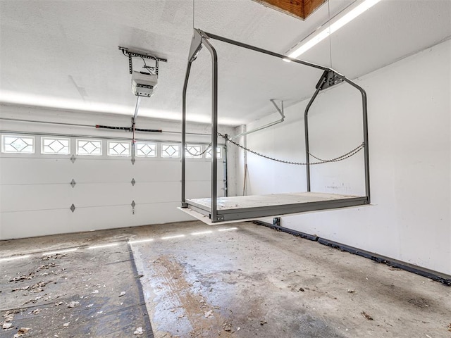 7705 Dripping Springs Ln, Oklahoma City, OK 73150 - garage featuring a garage door opener