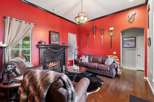 2528 E Bradley St, Shawnee, OK 74804 - living area with hardwood / wood-style flooring, arched walkways, ornamental molding, a high end fireplace, and baseboards