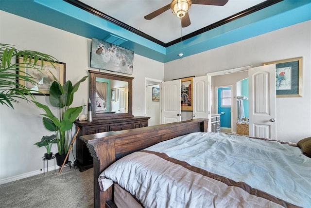 2528 E Bradley St, Shawnee, OK 74804 - carpeted bedroom featuring crown molding, baseboards, a ceiling fan, and ensuite bathroom