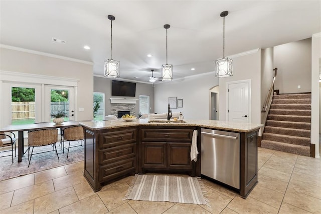 4932 Mahogany Dr, Edmond, OK 73025 - kitchen with dishwasher, a sink, ceiling fan, crown molding, and a stone fireplace