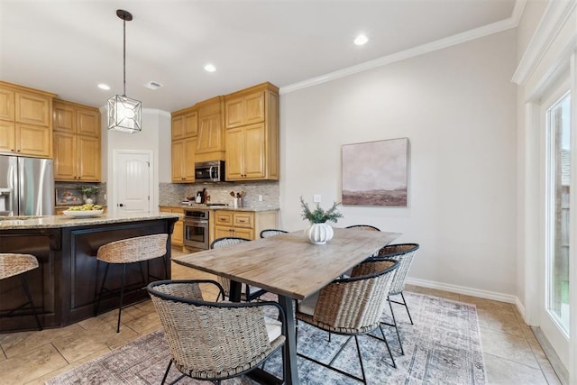 4932 Mahogany Dr, Edmond, OK 73025 - dining room featuring recessed lighting, ornamental molding, and baseboards