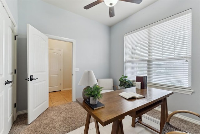 4932 Mahogany Dr, Edmond, OK 73025 - office with ceiling fan, baseboards, light carpet, and light tile patterned floors