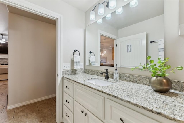 4932 Mahogany Dr, Edmond, OK 73025 - bathroom with vanity, tile patterned flooring, and baseboards