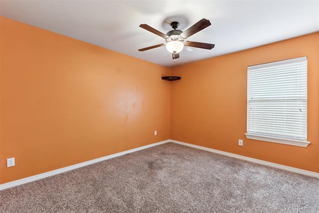 4932 Mahogany Dr, Edmond, OK 73025 - spare room with carpet flooring, ceiling fan, and baseboards