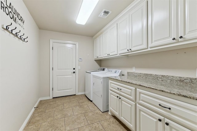4932 Mahogany Dr, Edmond, OK 73025 - laundry room featuring cabinet space, washer and clothes dryer, baseboards, and light tile patterned floors