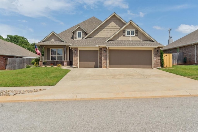 4932 Mahogany Dr, Edmond, OK 73025 - craftsman house with driveway, brick siding, a garage, and a shingled roof