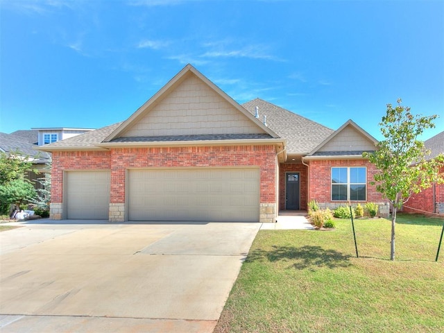 404 Braxton Way, Yukon, OK 73099 - view of front of property with an attached garage, a front yard, concrete driveway, a shingled roof, and brick siding
