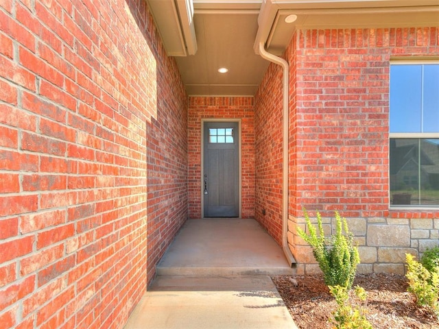 404 Braxton Way, Yukon, OK 73099 - property entrance with brick siding
