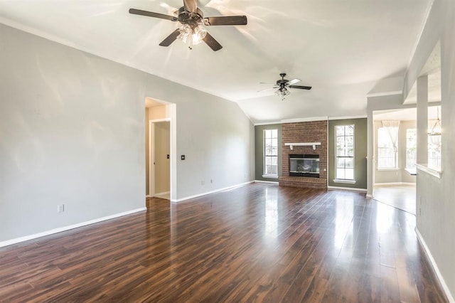 3305 Outpost Cir, Norman, OK 73072 - unfurnished living room featuring a ceiling fan, baseboards, dark wood-type flooring, vaulted ceiling, and ornamental molding