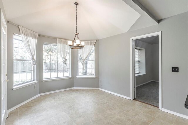 3305 Outpost Cir, Norman, OK 73072 - unfurnished dining area with a chandelier and baseboards