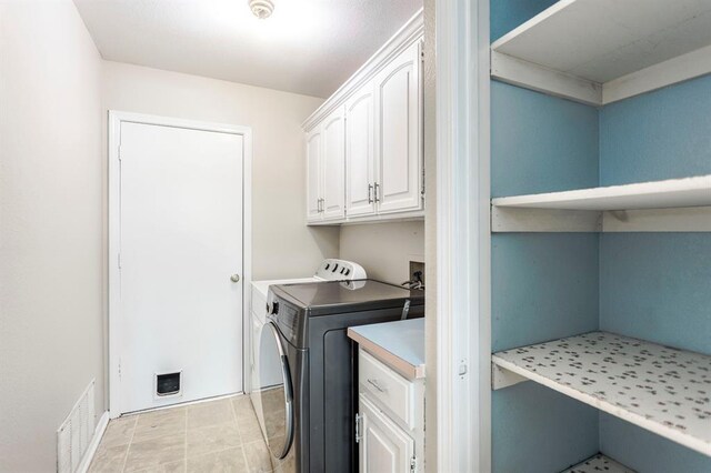 3305 Outpost Cir, Norman, OK 73072 - washroom featuring cabinet space and washer and dryer