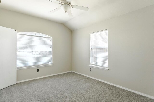 3305 Outpost Cir, Norman, OK 73072 - carpeted empty room with a ceiling fan, lofted ceiling, and baseboards