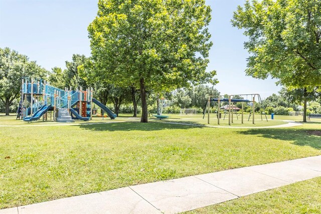 3305 Outpost Cir, Norman, OK 73072 - communal playground featuring a yard