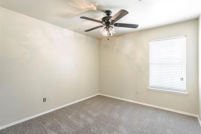 3305 Outpost Cir, Norman, OK 73072 - empty room featuring carpet, ceiling fan, and baseboards