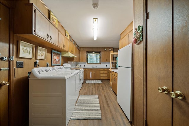 1392 Robin Hood Rd, Eufaula, OK 74432 - laundry area with separate washer and dryer and light wood-style flooring