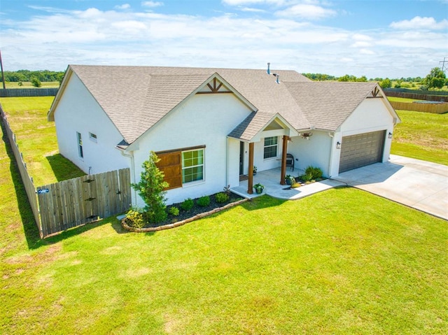 11611 Carefree Ln, Shawnee, OK 74804 - view of front of property with concrete driveway, a shingled roof, stucco siding, and a garage