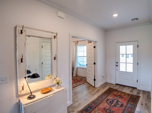 11611 Carefree Ln, Shawnee, OK 74804 - entryway featuring crown molding, light wood finished floors, and baseboards