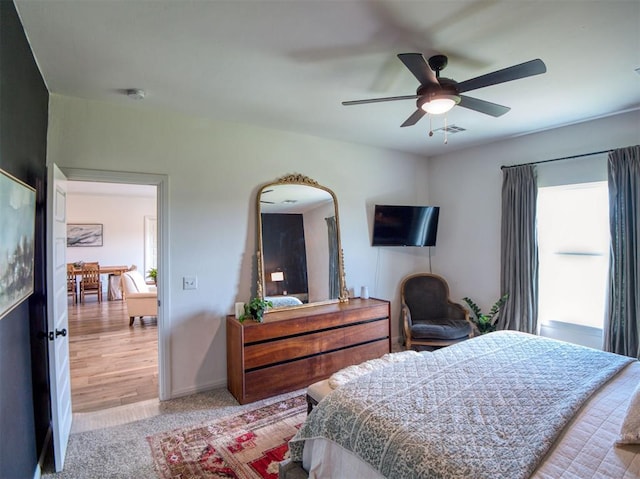 11611 Carefree Ln, Shawnee, OK 74804 - carpeted bedroom featuring baseboards and a ceiling fan
