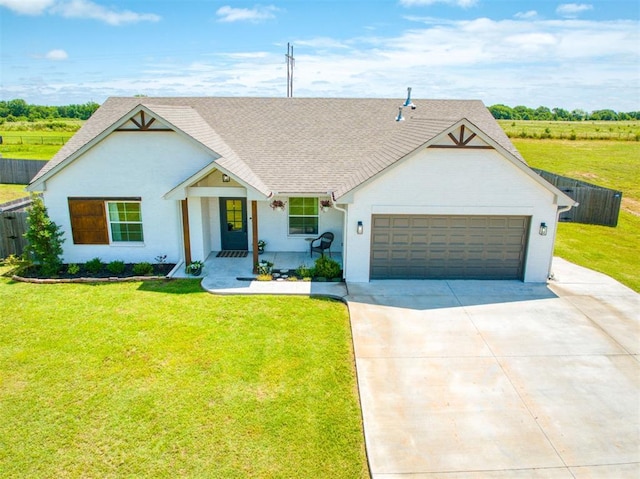 11611 Carefree Ln, Shawnee, OK 74804 - view of front of home with a garage, concrete driveway, and a shingled roof