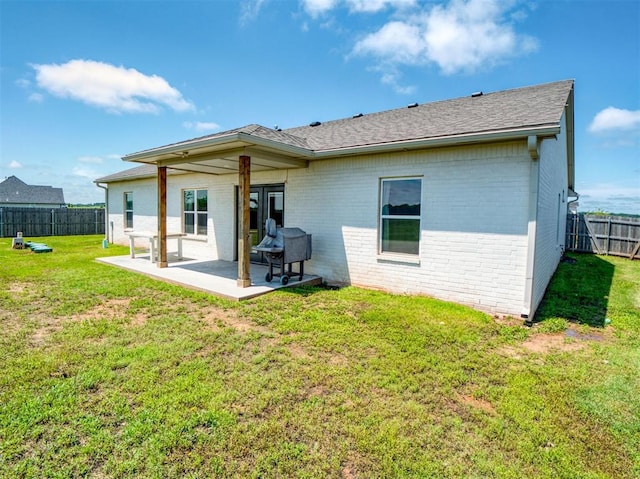 11611 Carefree Ln, Shawnee, OK 74804 - back of house with brick siding, a patio, and a shingled roof