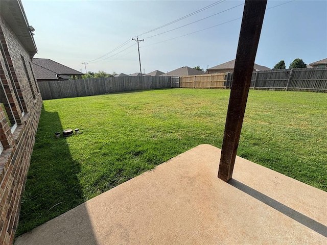 11232 NW 101st St, Yukon, OK 73099 - view of yard with a patio area