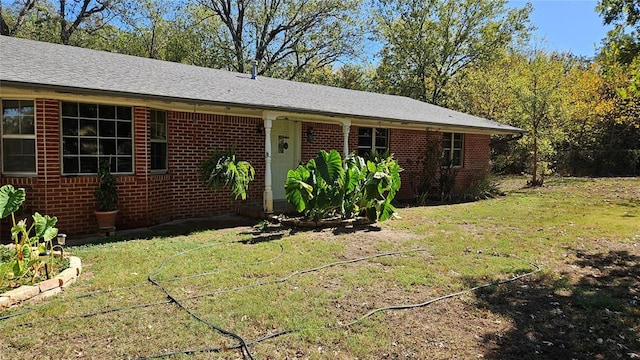 4001 N Bryan Ave, Shawnee, OK 74804 - single story home with a front yard, brick siding, and a shingled roof