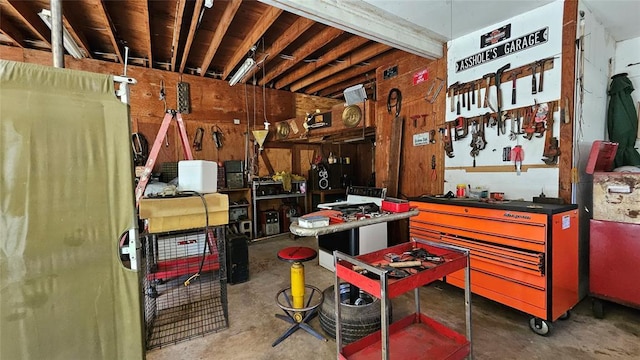 4001 N Bryan Ave, Shawnee, OK 74804 - miscellaneous room with a workshop area and unfinished concrete flooring
