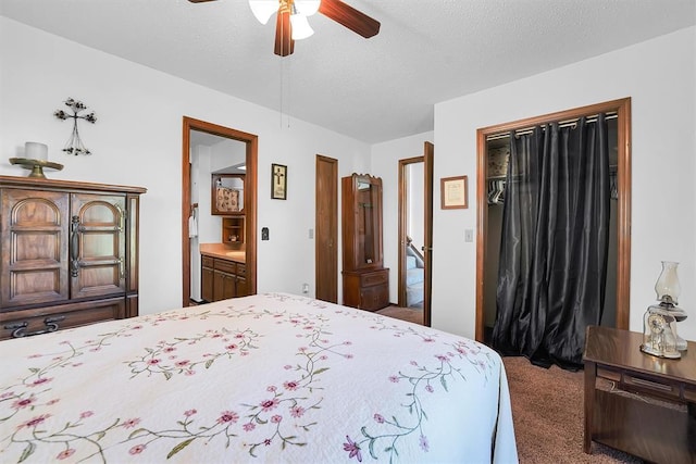409 S Mcdonald St, Dill City, OK 73641 - bedroom featuring carpet floors, a ceiling fan, a textured ceiling, and a closet