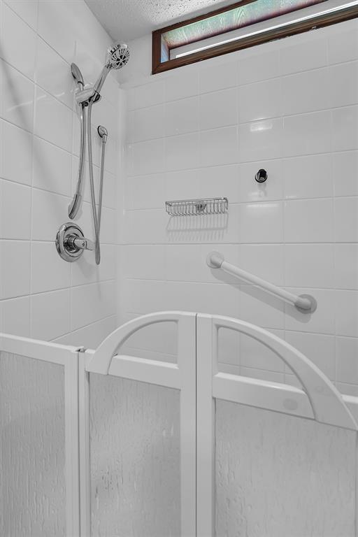 409 S Mcdonald St, Dill City, OK 73641 - full bathroom featuring a stall shower