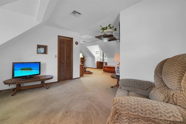 409 S Mcdonald St, Dill City, OK 73641 - bonus room with carpet floors, baseboards, and a textured ceiling