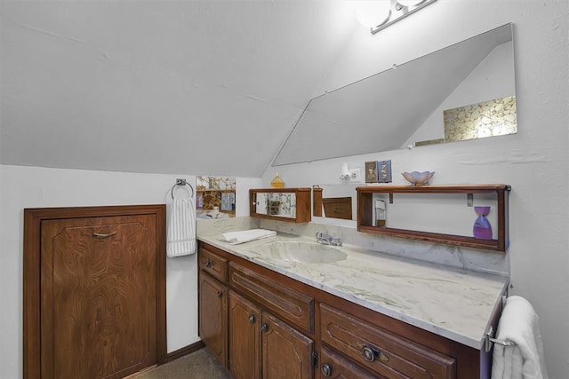 409 S Mcdonald St, Dill City, OK 73641 - bathroom with vaulted ceiling and vanity
