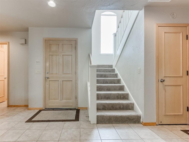 1312 Every Dr, Edmond, OK 73034 - foyer featuring stairs, baseboards, and light tile patterned floors