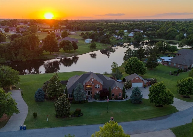 205 W Waterfront Dr, Tuttle, OK 73089 - aerial view at dusk of a water view