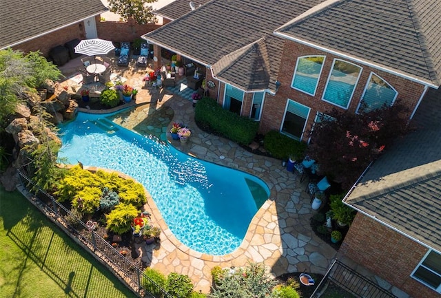 205 W Waterfront Dr, Tuttle, OK 73089 - view of swimming pool with a patio area and a fenced backyard