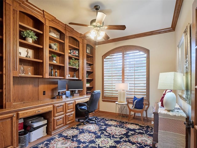 205 W Waterfront Dr, Tuttle, OK 73089 - office space featuring built in desk, a ceiling fan, ornamental molding, baseboards, and wood finished floors