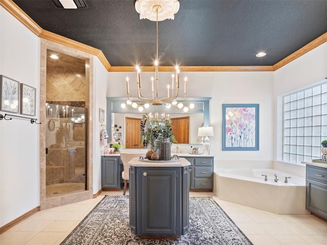 205 W Waterfront Dr, Tuttle, OK 73089 - bathroom featuring vanity, a bath, tile patterned flooring, ornamental molding, and a shower stall
