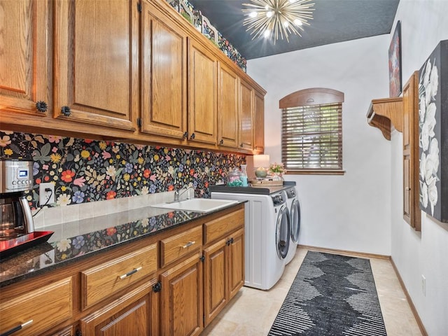 205 W Waterfront Dr, Tuttle, OK 73089 - laundry area featuring washer and dryer and cabinet space