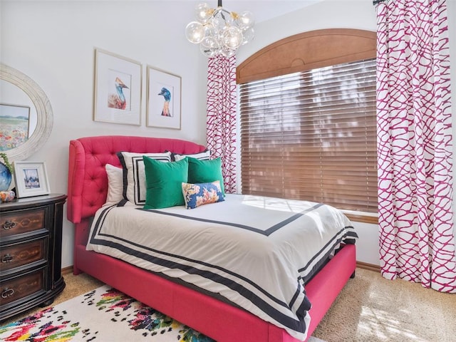 205 W Waterfront Dr, Tuttle, OK 73089 - carpeted bedroom with a chandelier