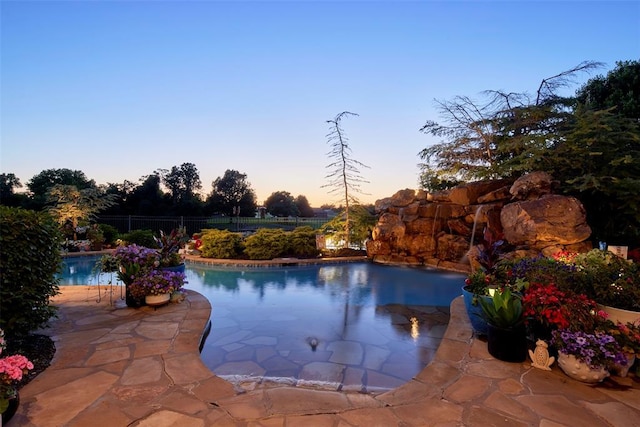 205 W Waterfront Dr, Tuttle, OK 73089 - view of pool at dusk